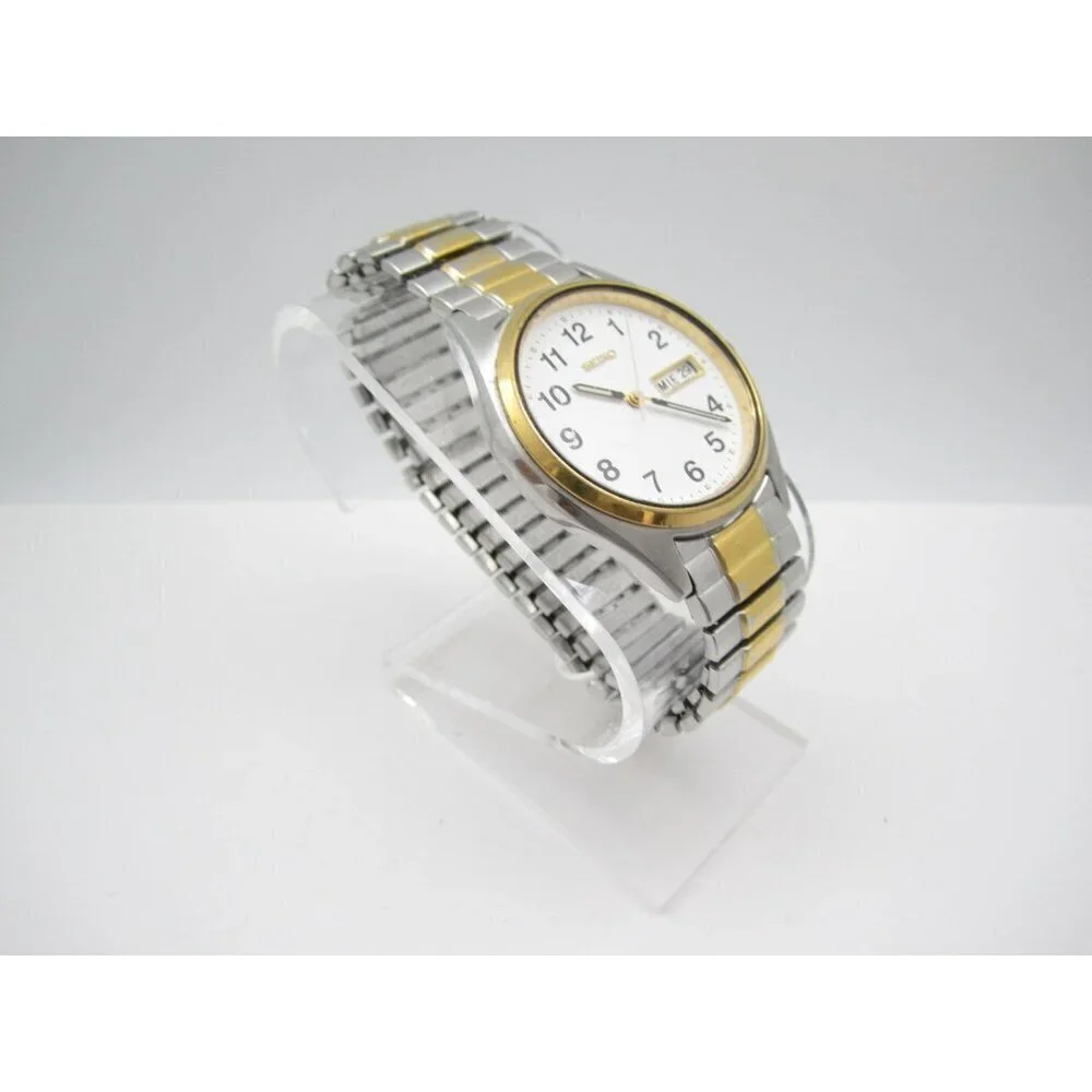 Vtg‎ Men Seiko Quartz WR Analog 35mm Day Date Round Watch (H773) 